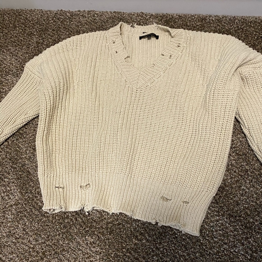 Distressed sweater